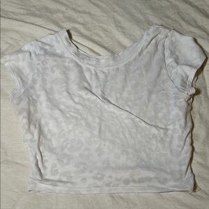 Bombshell Sportswear White Leopard Crop Top